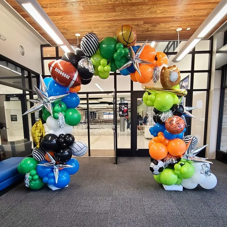 Sports-themed balloon arch for a campus event
